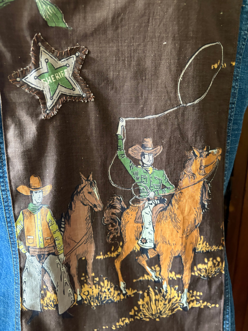 Denim vest with cowboy panel