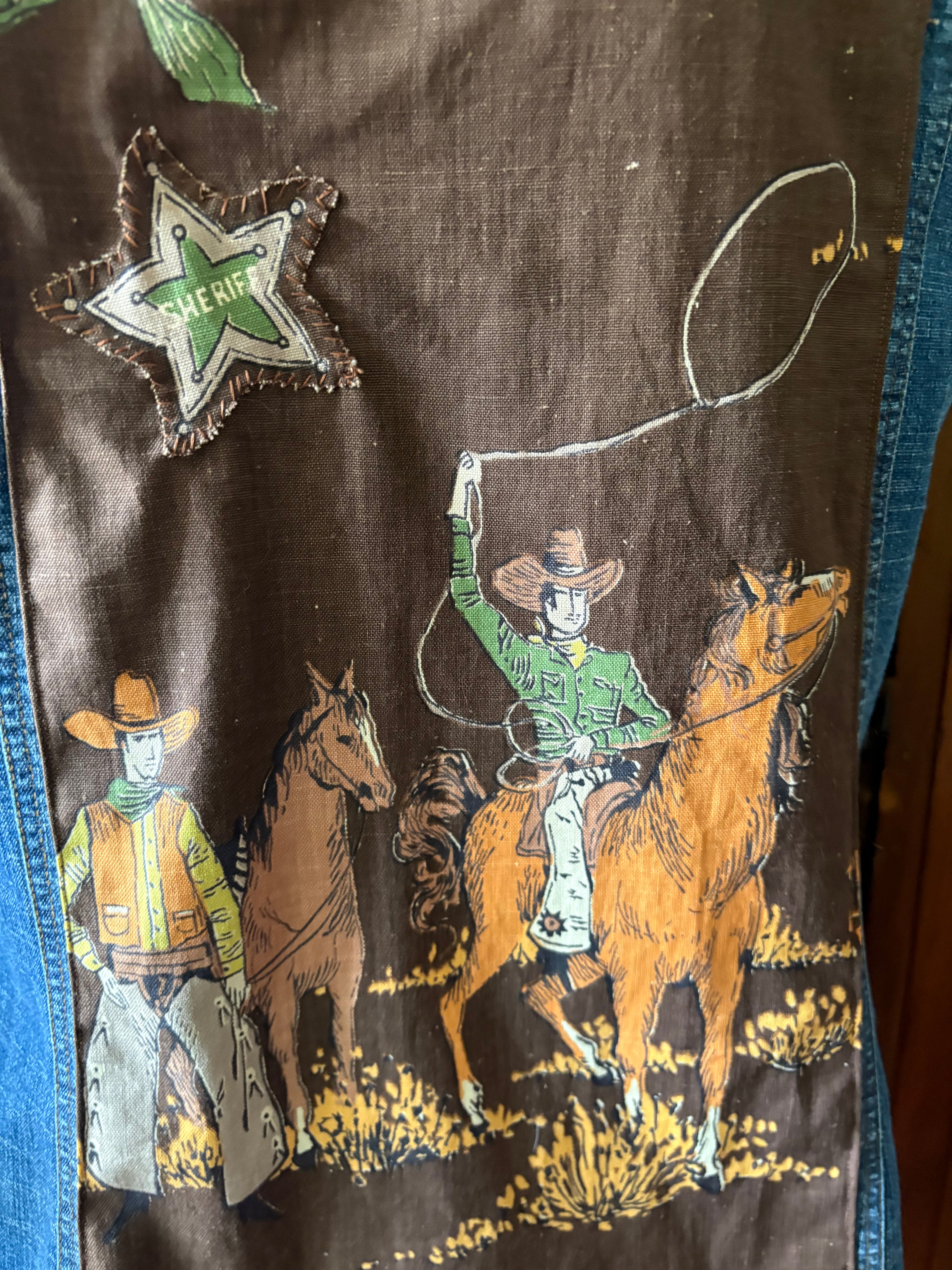 Denim vest with cowboy panel