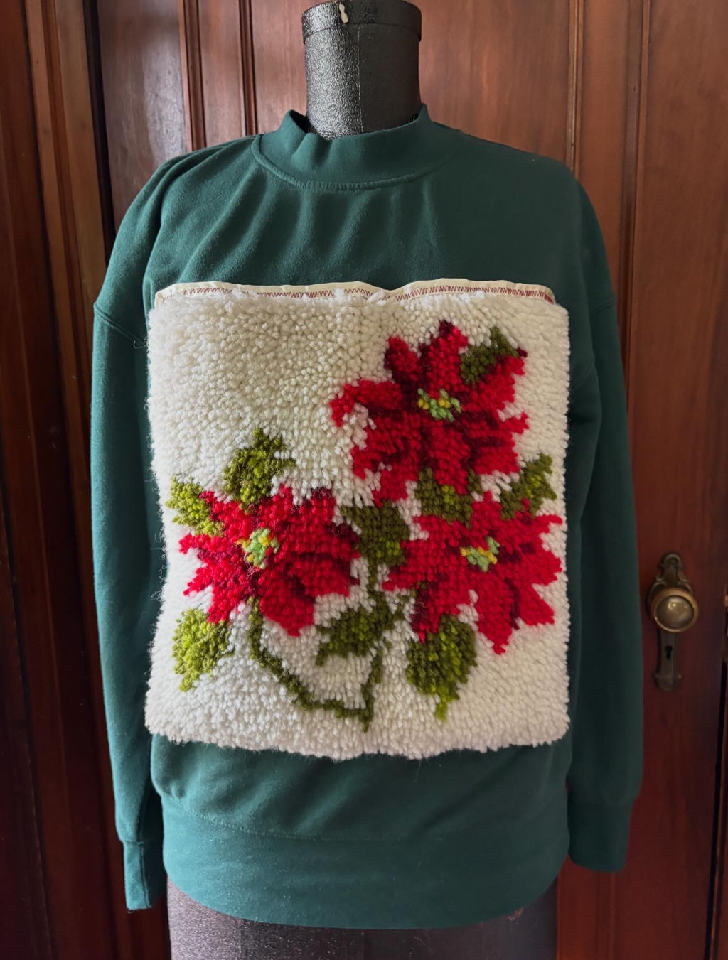 Poinsettia rug sweatshirt